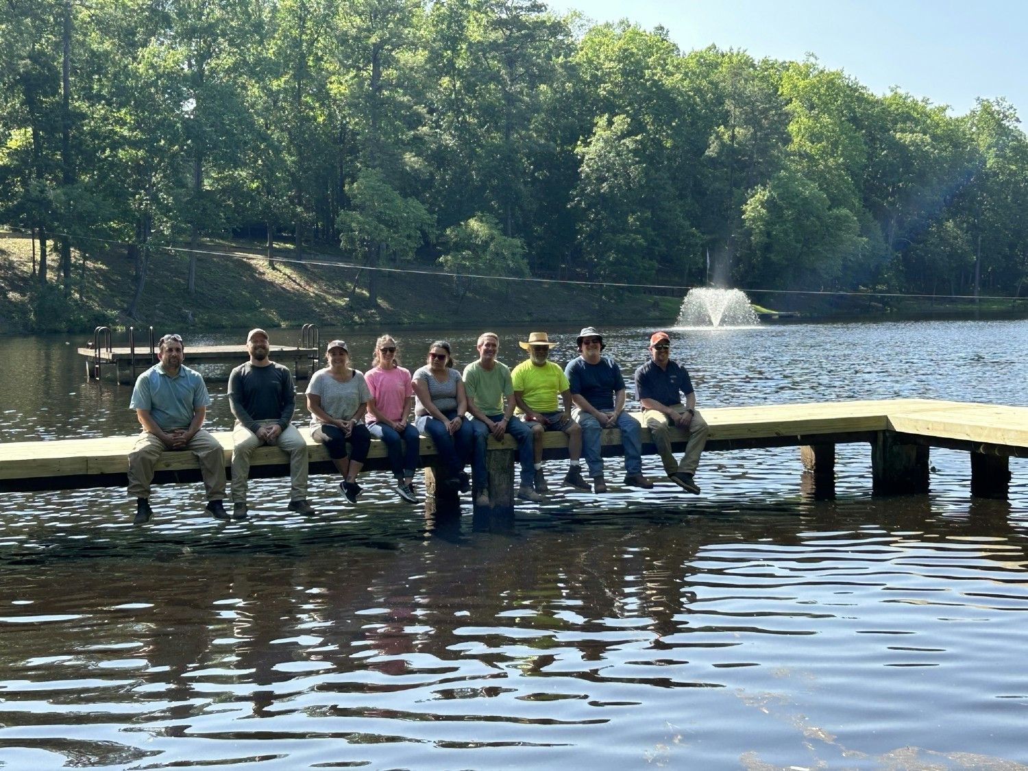 The Hourigan team donated a day of hard work to YMCA Camp Thunderbird by replacing an old, unsafe fishing dock.