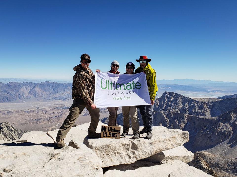 Even when cresting Mt. Whitney at 14,505 feet, UltiPeeps share their pride in Ultimate Software.