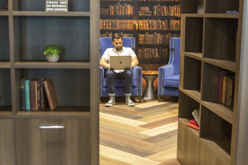 The hidden library in Ultimate Software's San Francisco office is one of many innovative workspaces in our buildings.
