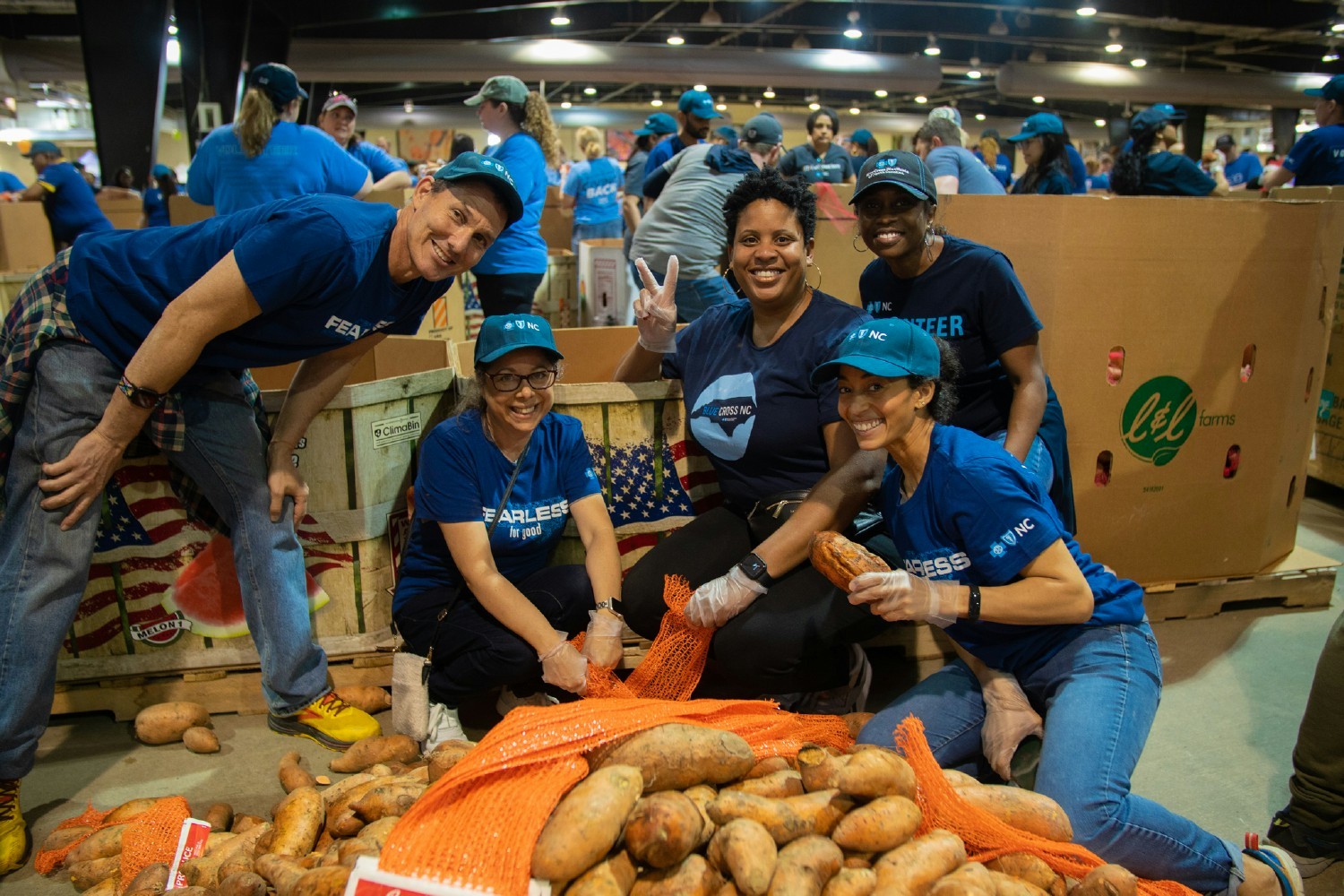 Team work, makes the dreams (about sweet potatoes) work. Supporting our local food bank.