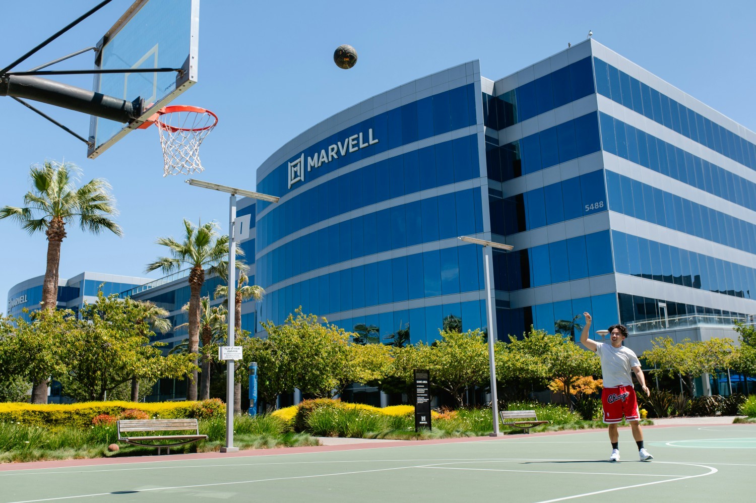 A Marvell employee taking an exercise break and enjoying a game of basketball. 