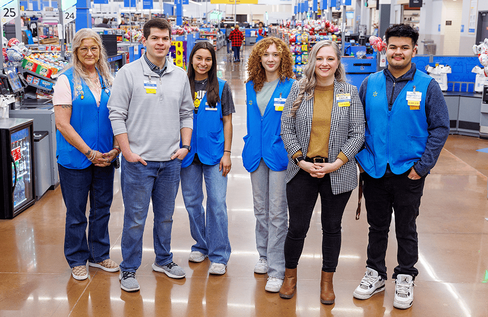 Team of smiling Walmart associates.