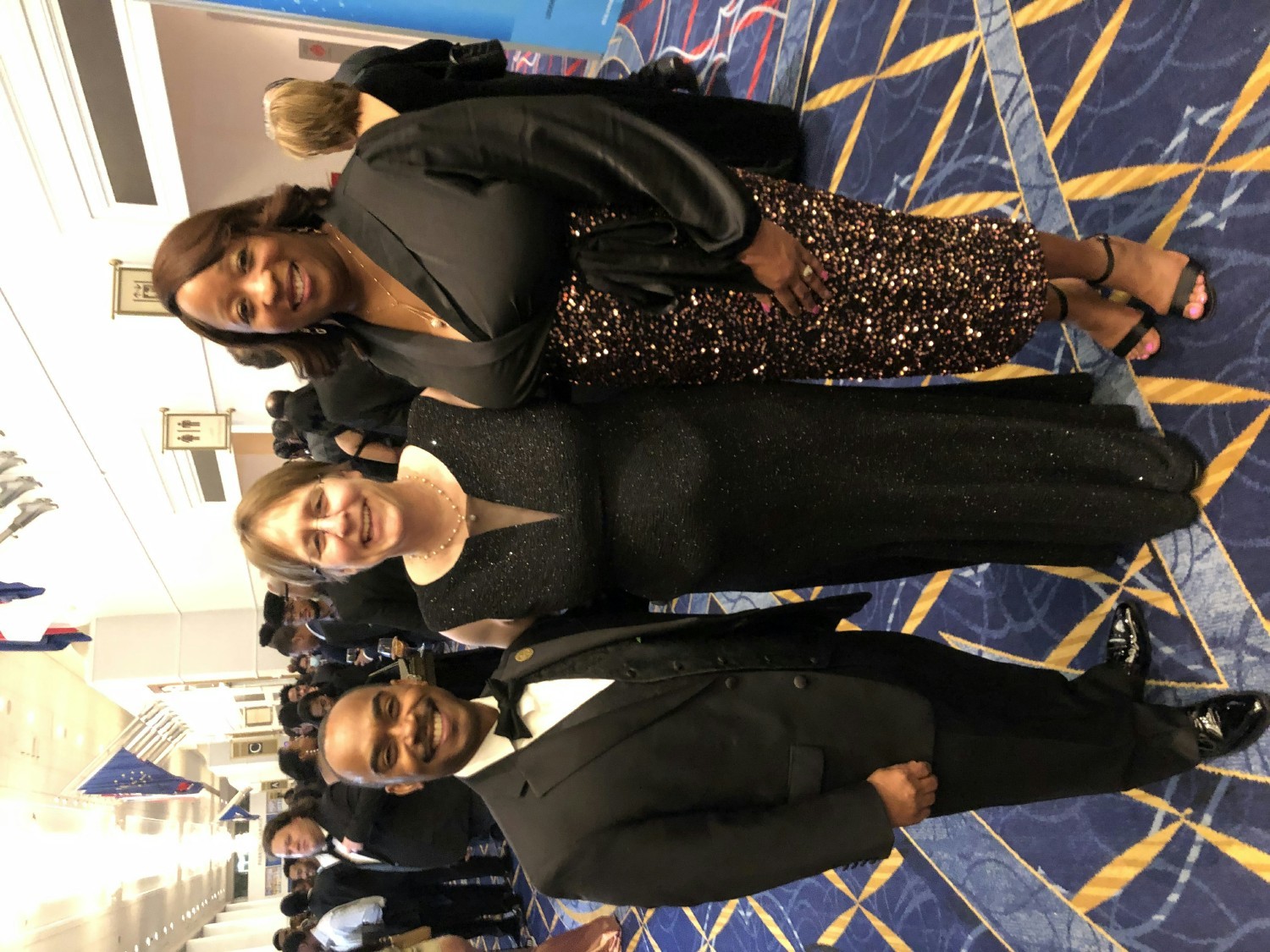 VP of Civil Programs Michael Hollis, CEO Janet Grondin, and Tameika Hollis at Black Engineer of the Year Awards