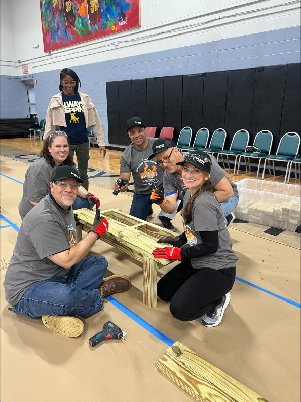 Workforce Development team is helping build community through benches during Women in Construction event in Charlotte.