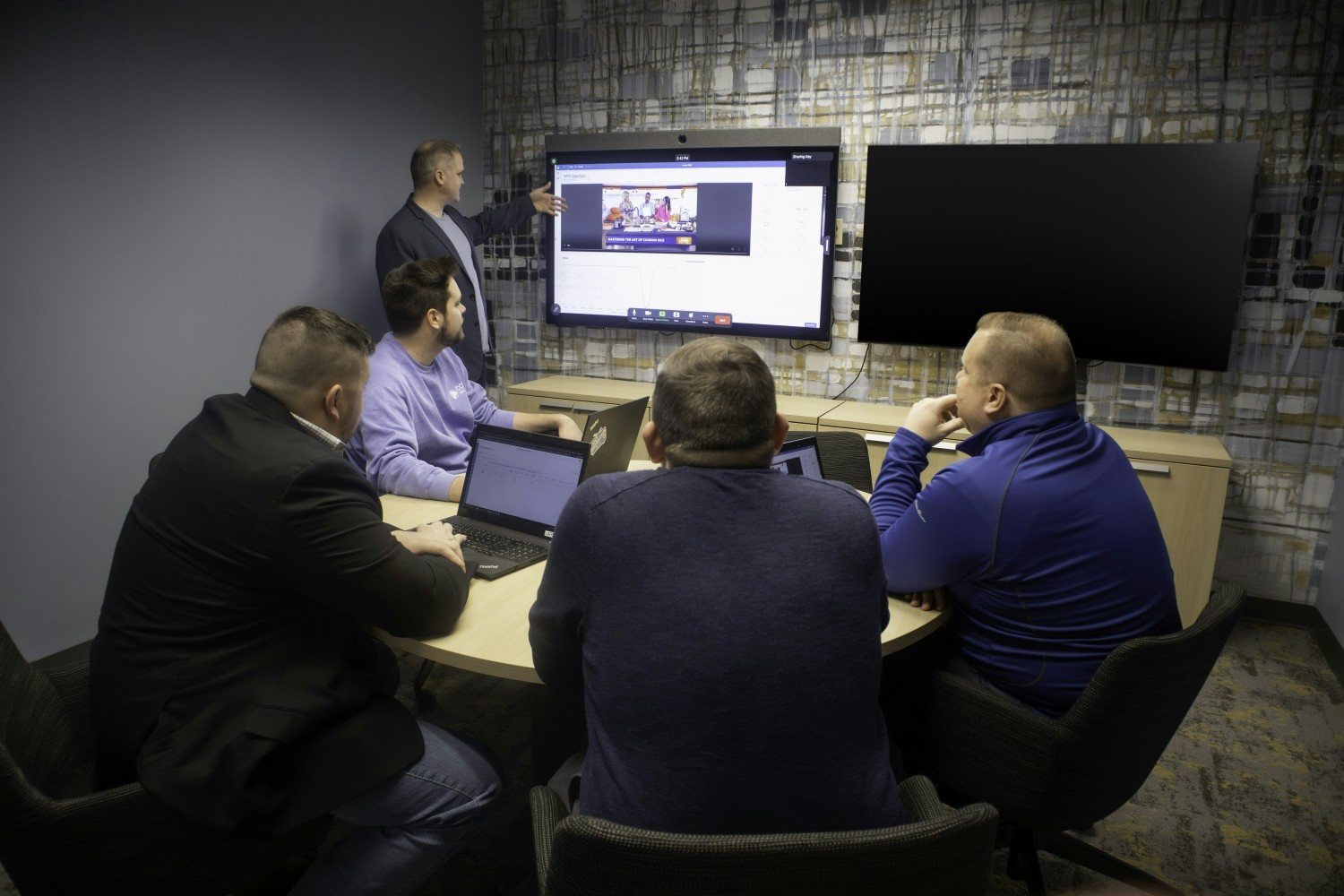 CCR Team Members collaborating in recently renovated meeting spaces