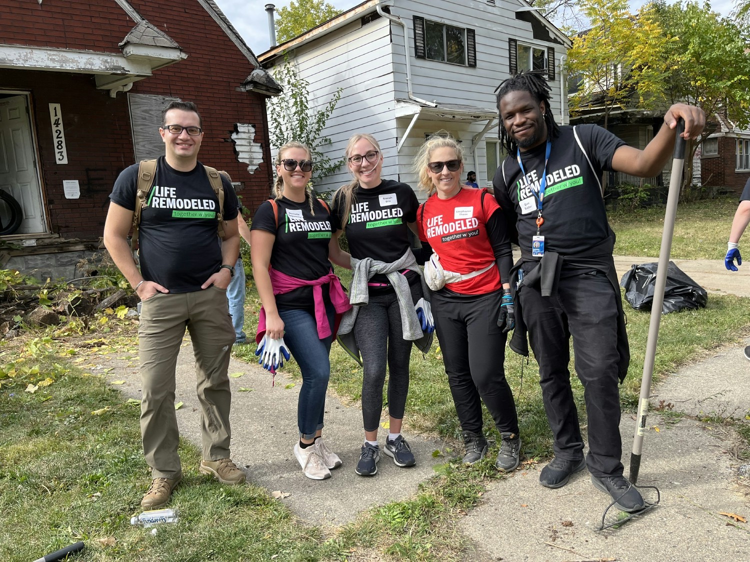 Dedicated Sun team members during a day spent cleaning up a local Detroit neighborhood with Life Remodeled. 