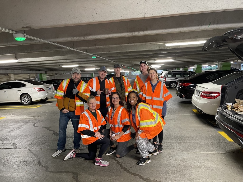 TIAG employees join forces in cleaning up our environment for Adopt-a-Highway cleanup in Reston, VA.