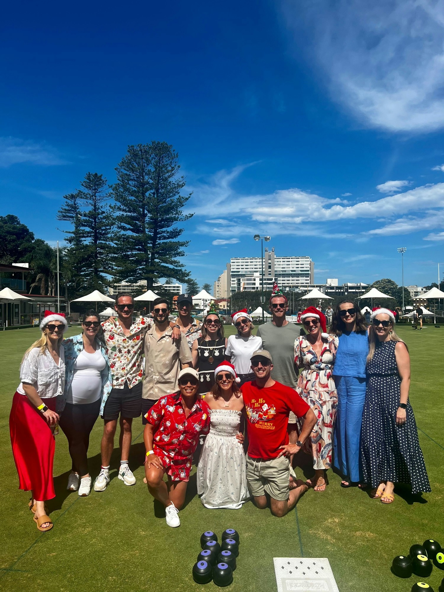 HubSpot Sydney team members enjoying a game of Lawn Bowls in the sun.
