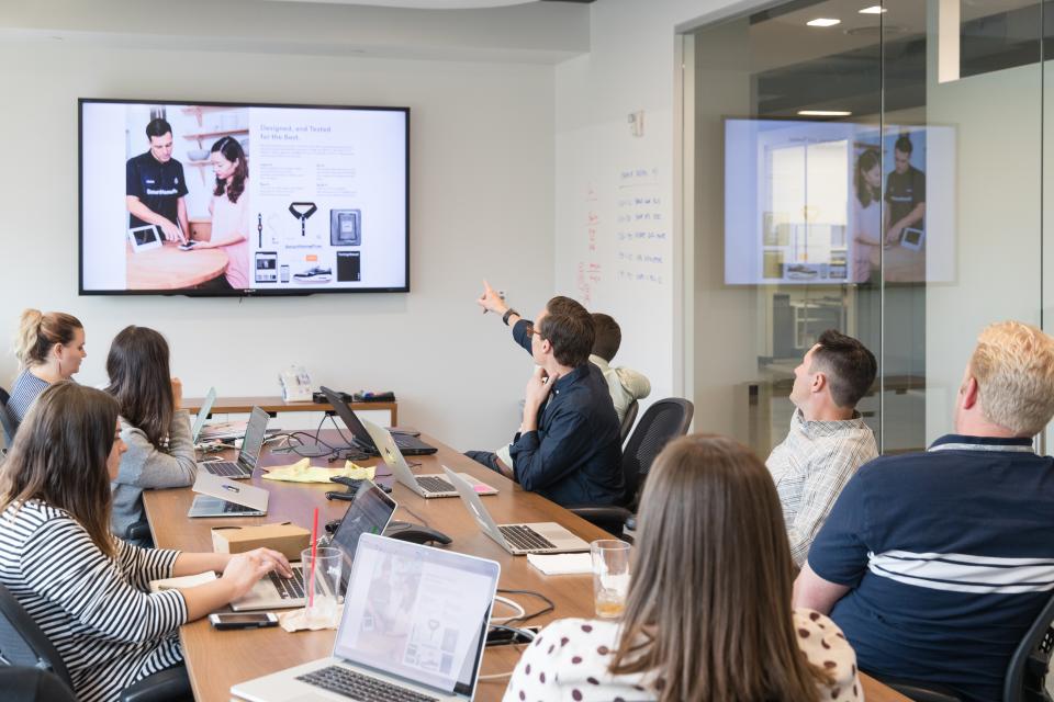 Vivint Smart Home employees during a meeting at the Vivint Innovation Center in Lehi, Utah.