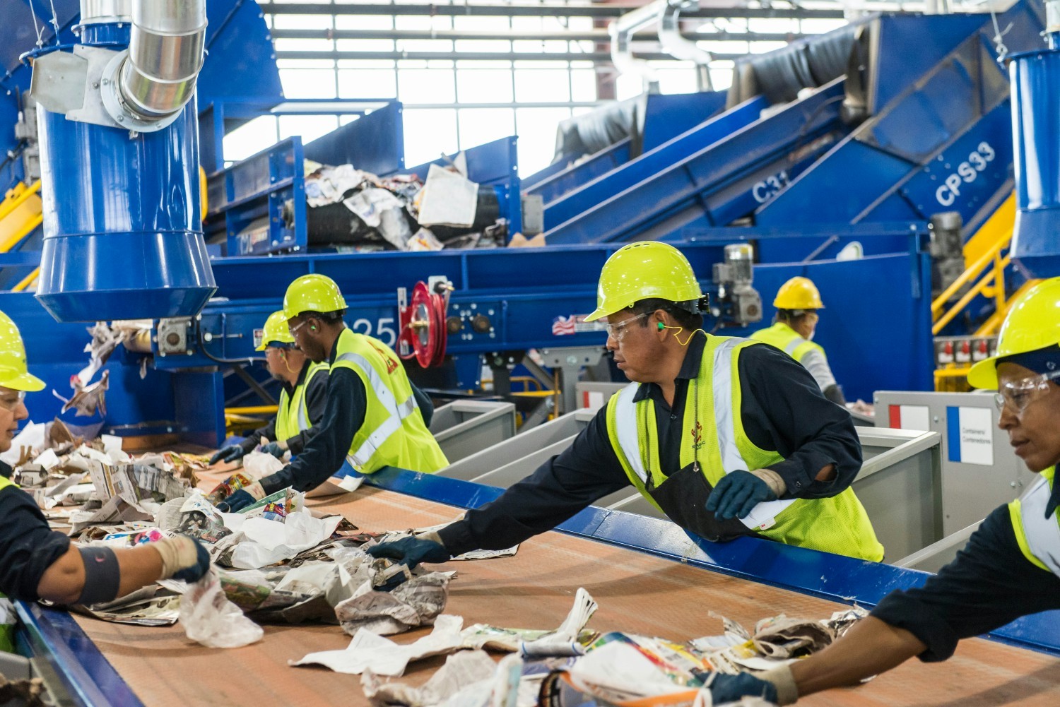 Republic Services employees sort recyclables at our recycling center. In 2022, we processed over 5M tons of recyclables.