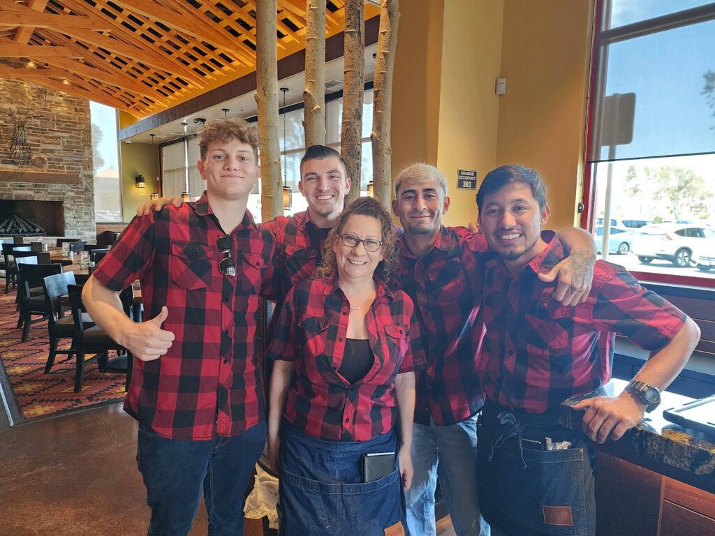 Great minds think a like!  Teammates showed up to work in the same shirt.  