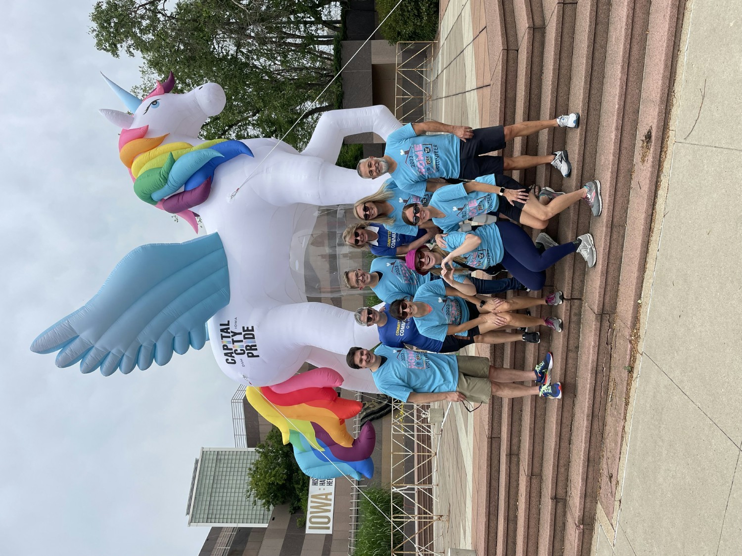 Members of our LGBTQ+ Club and other ITA team members supporting the local Pride Parade.