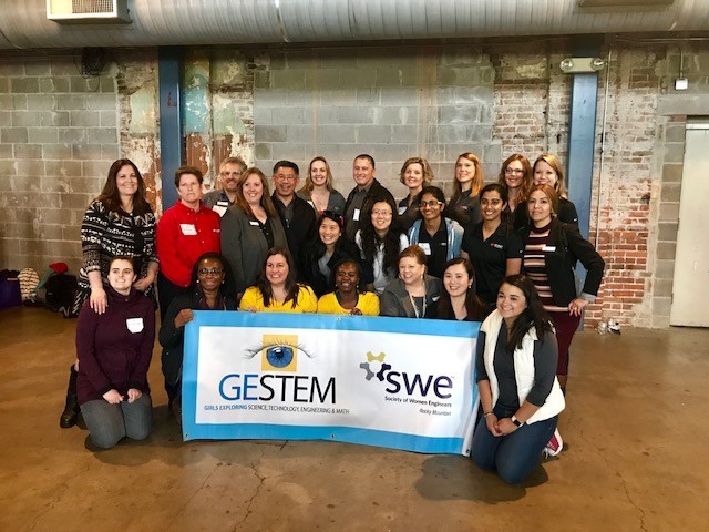 Employees participate in a SWE-sponsored STEM event