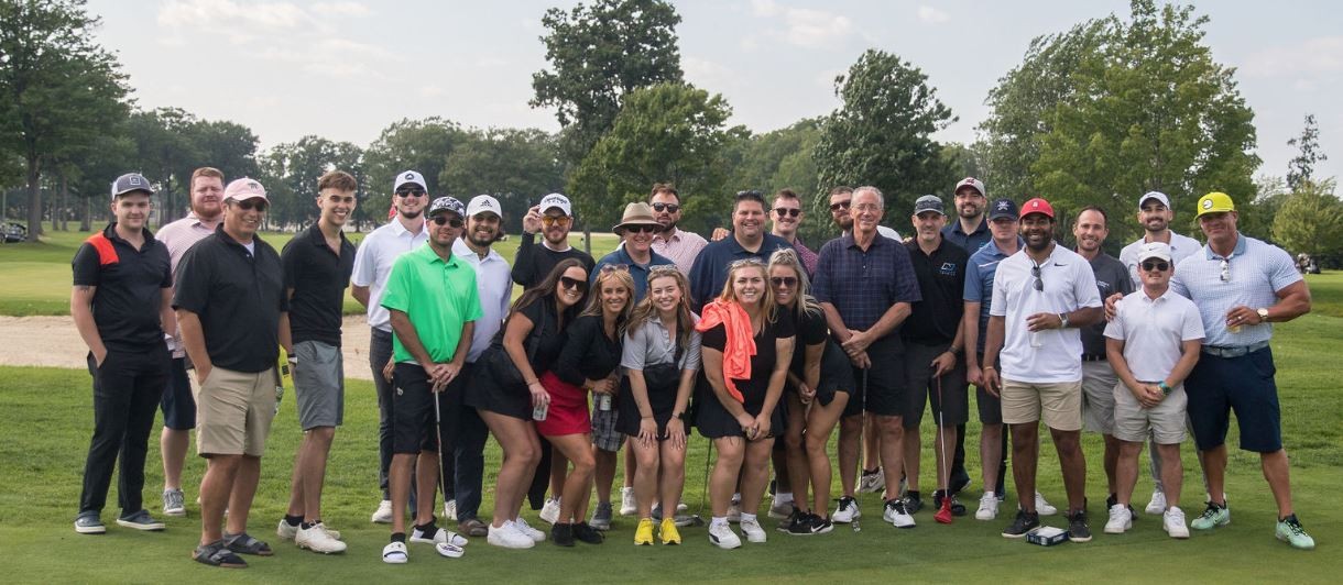 Nations Lending employees pose for a group picture from our summertime golf outing