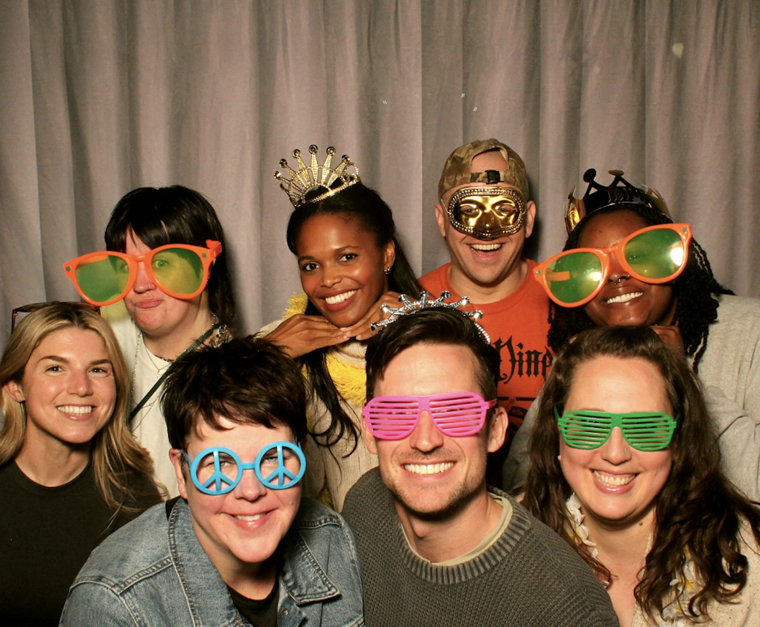 Members of our People & Organizational Success team take a photo booth picture during a recent People team offsite.