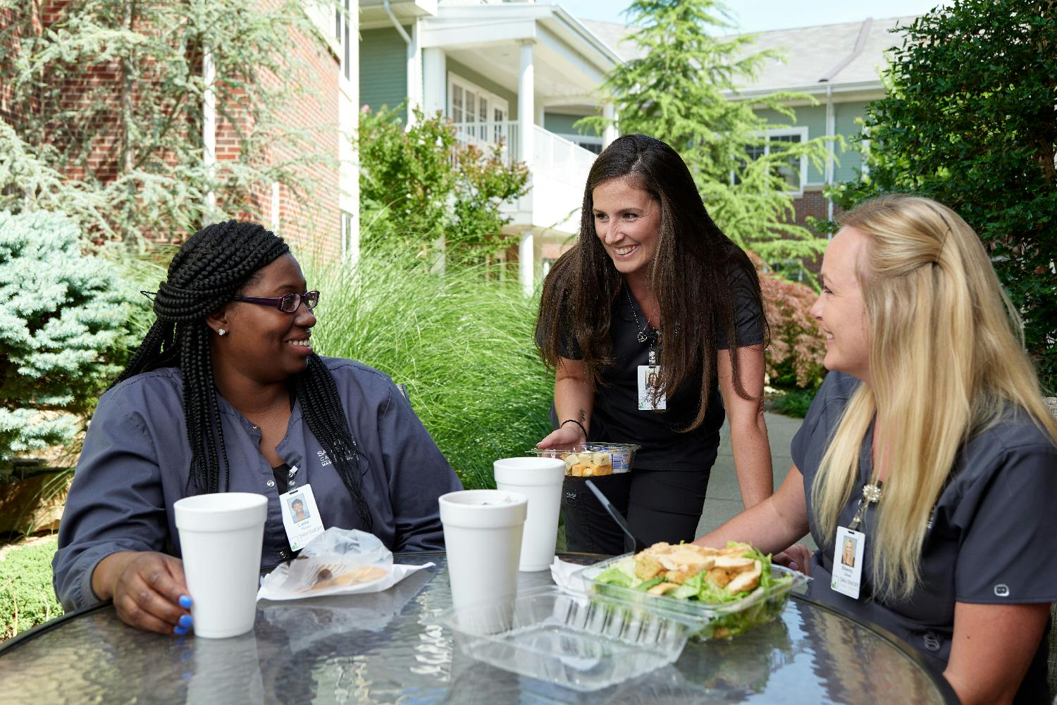 Nurses enjoying lunch together. Nurses are a critical key to our success in providing resident care services.