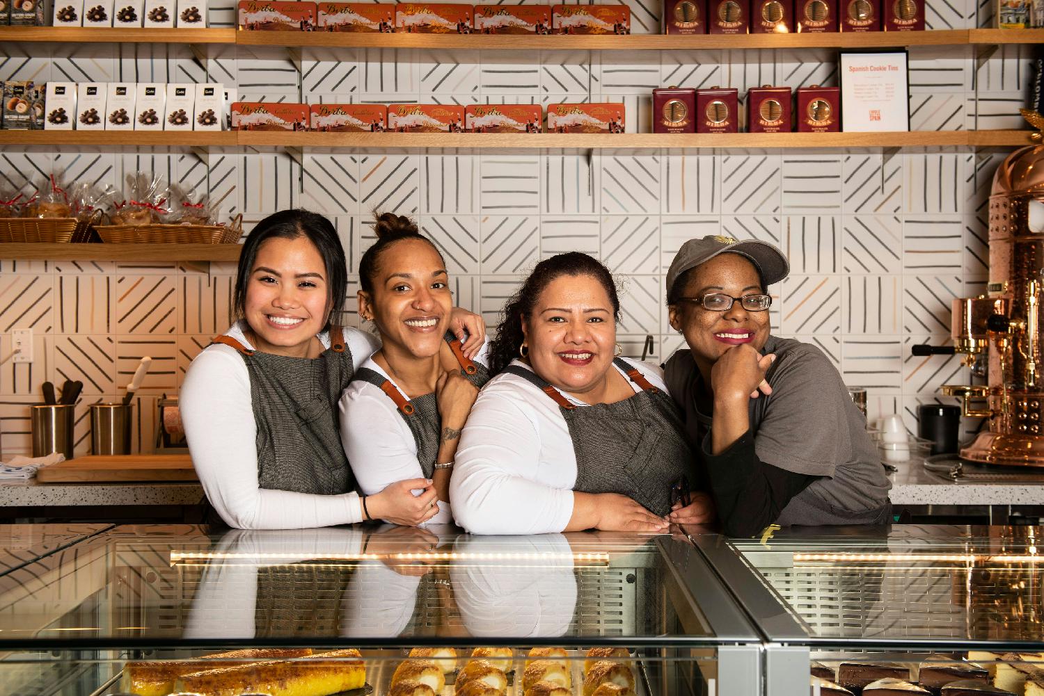 Pasteleria staff at Mercado Little Spain in NYC.