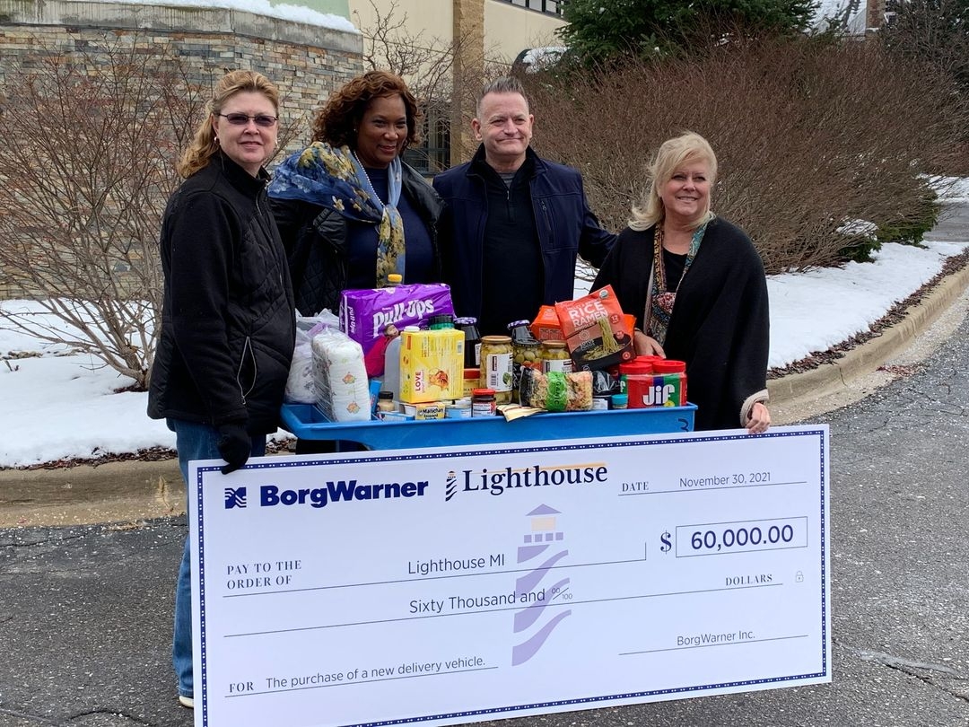 Auburn Hills team donated $60,000 to Lighthouse to buy hybrid electric refrigerated truck for local food delivery 