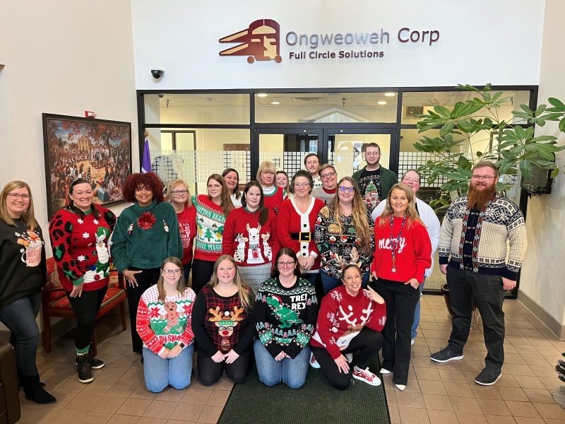 Happy holidays from our team to yours! Ugly Sweater Day at the office. 