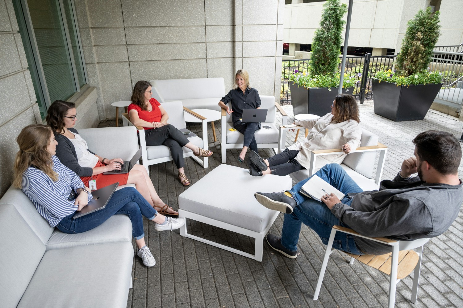 The marketing team enjoying the great outdoors...or at least a patio at our HQ