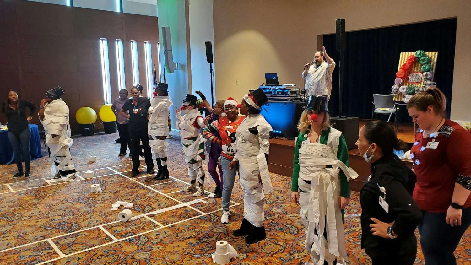 Holiday Party fun included a hilarious snowman contest.