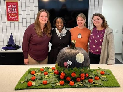 The winning pumpkin decorating team from the Indianapolis office. 