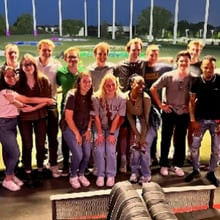 2023 interns pictured at the intern summit event at TopGolf in May 2023. 
