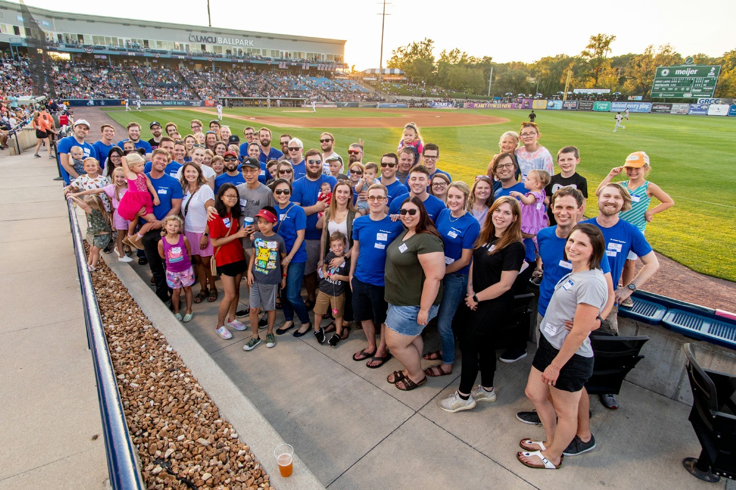 Michigan Software Labs spends an evening at a Whitecaps baseball game with their families at the LMCU Ballpark.
