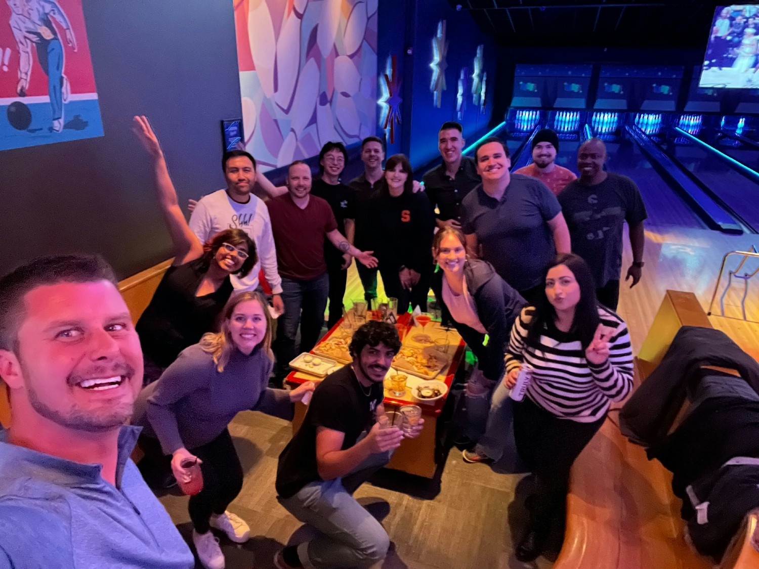Q-Centrix's Product and Engineering team members enjoy working together... on and off the the lanes.