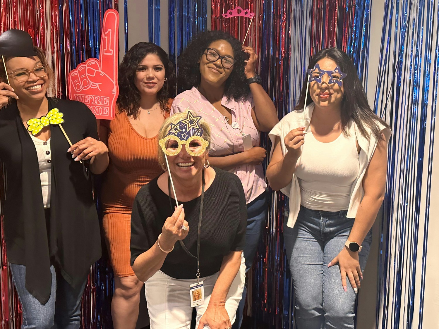 Flagship associates strike a pose at a photo booth during Associate Appreciation Day.