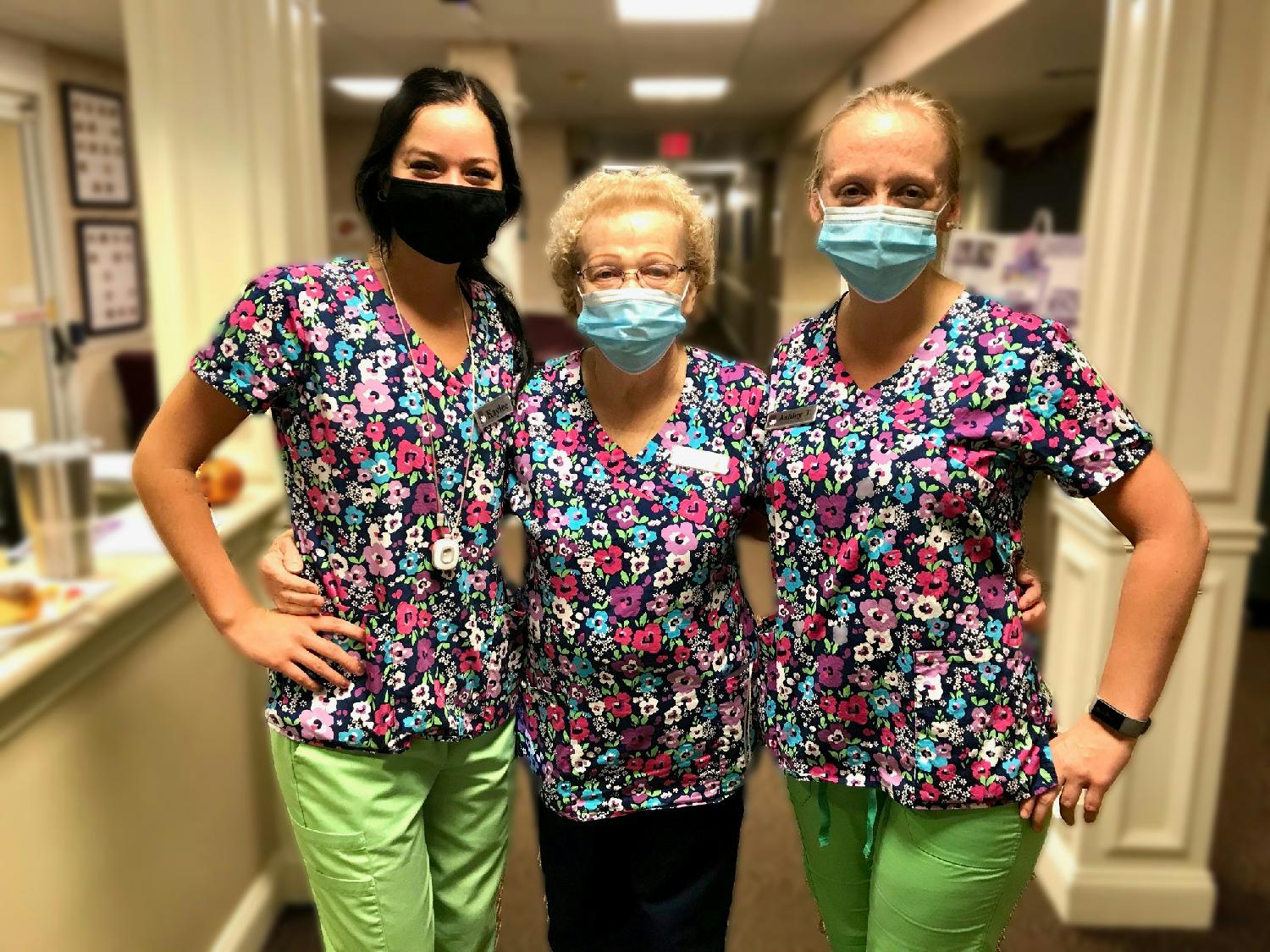Our wonderful Resident Care Associates showing off their new scrubs!