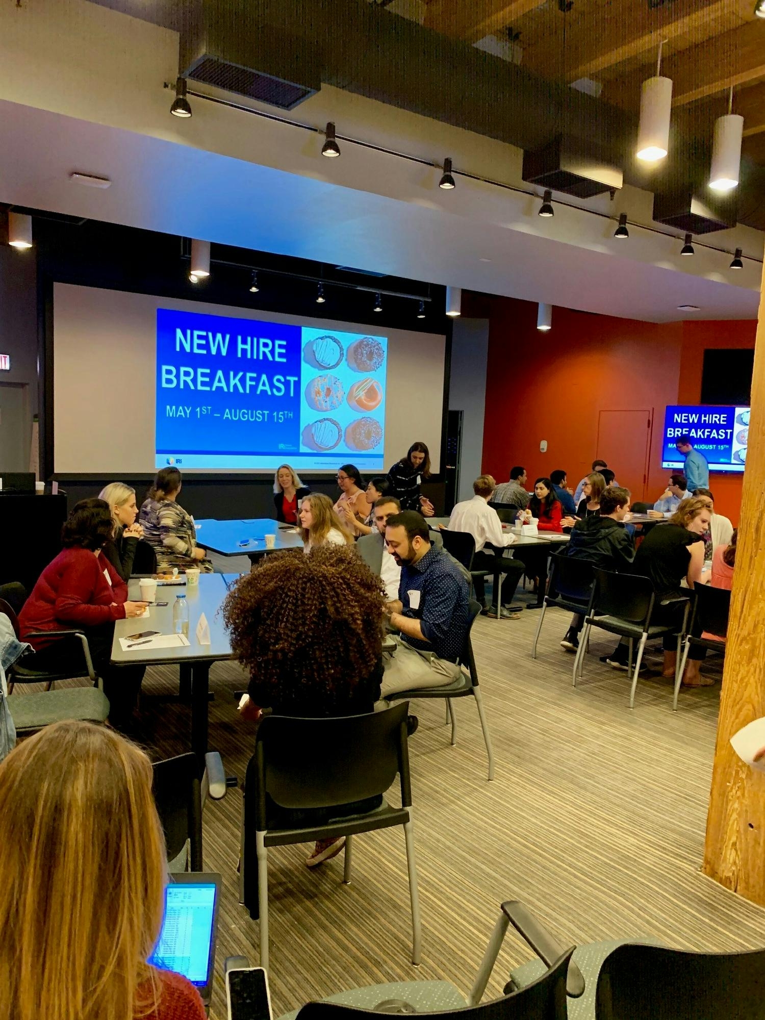 Welcoming our newest IRI team members at the new hire breakfast.
