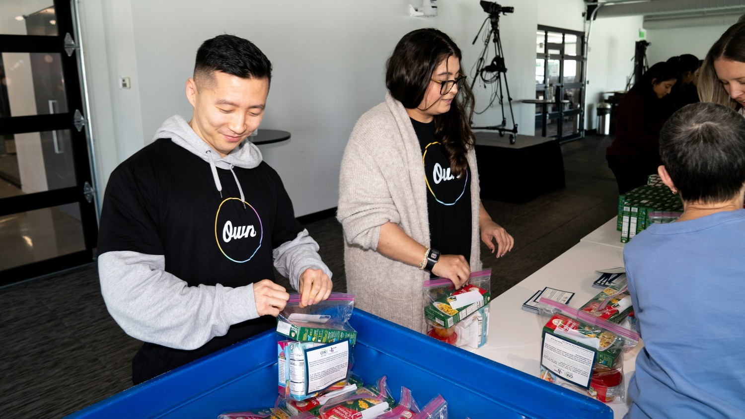 Colleagues at our New Jersey HQ create food packs for children facing food insecurity.  