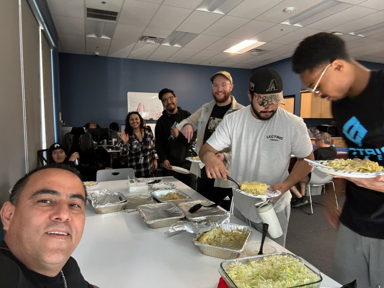 Our warehouse team having their weekly catered lunc