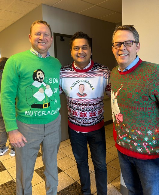 L-R Rob Meriweather, Niraj Patel, CEO Brian LaDuke.  An ugly sweater contest or a 