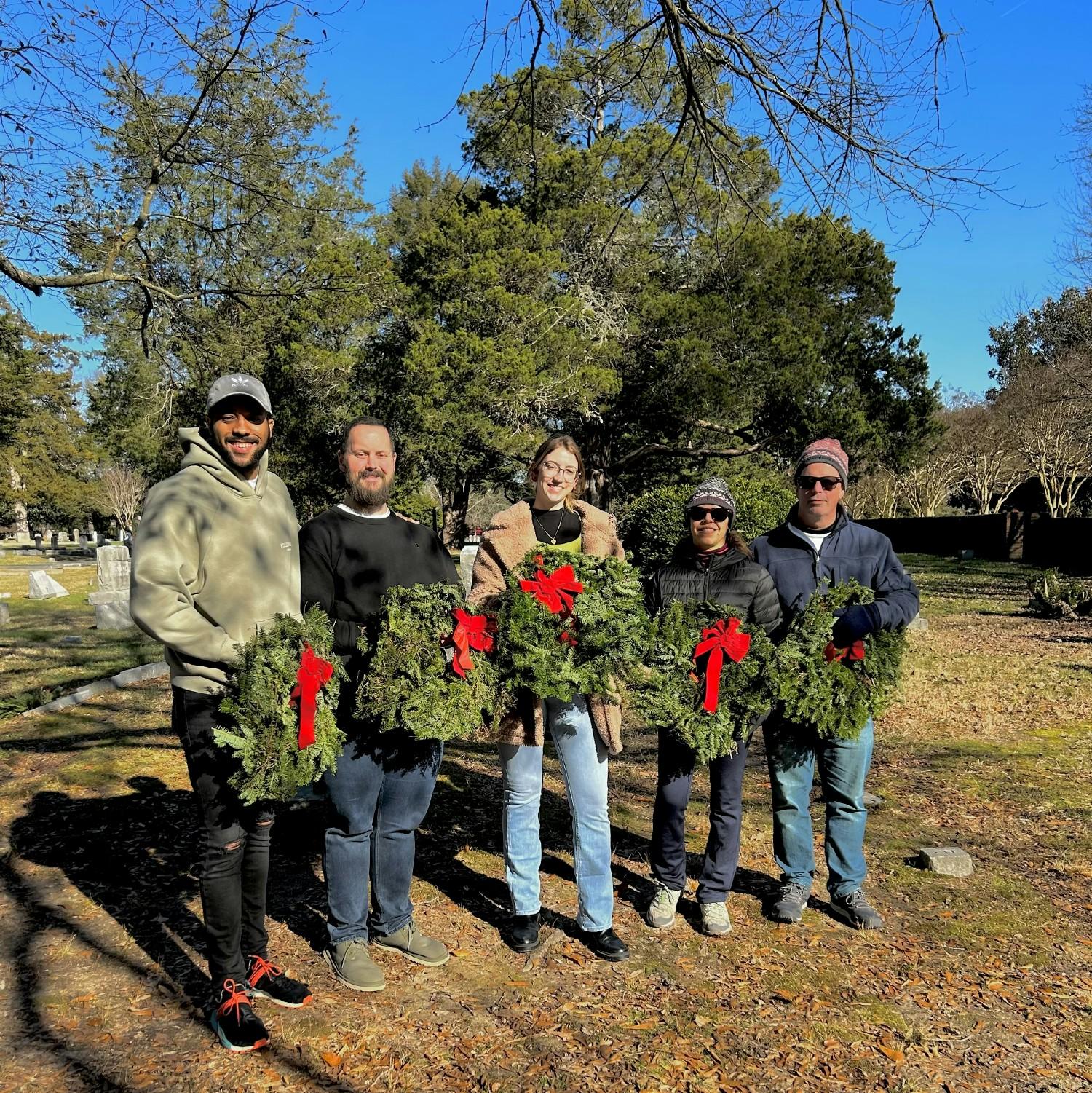 Virginia team members volunteering at Wreaths Across America in Williamsburg. 
