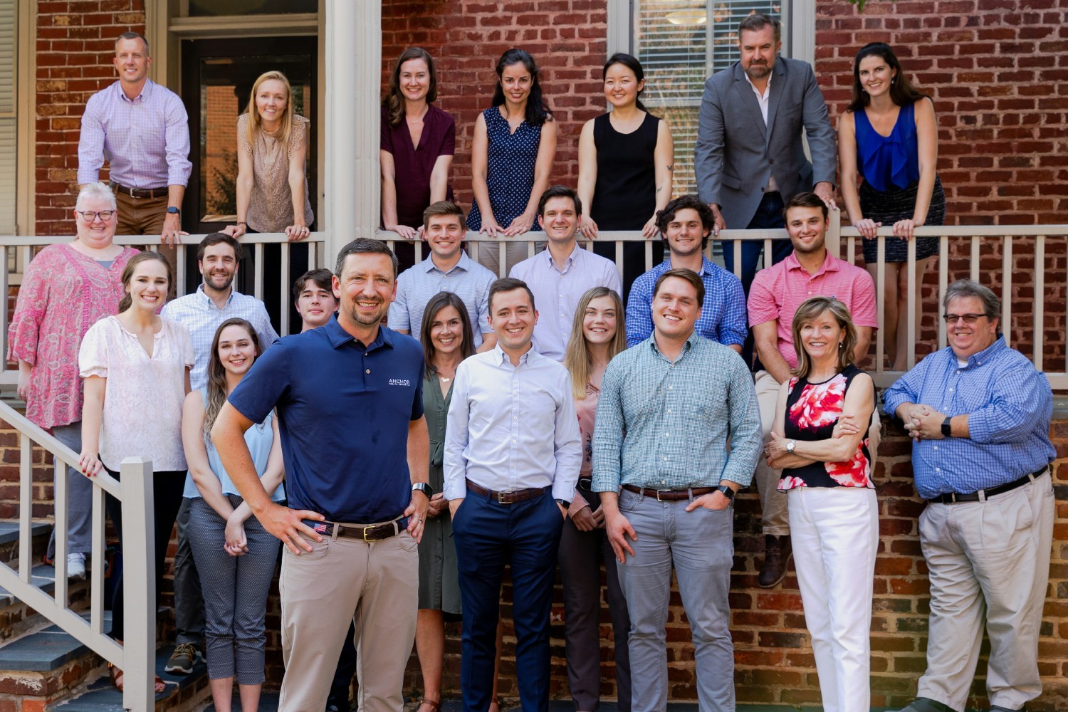 Ben Ochs, Chief Executive Officer & Managing Partner, with the team outside of our headquarters in Charlottesville, VA.