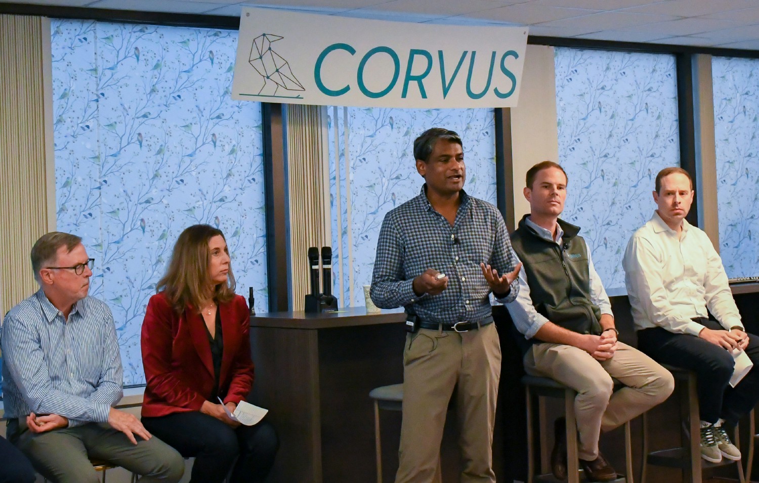Corvus's executive leadership addresses employees during an all-hands meeting in the Boston office