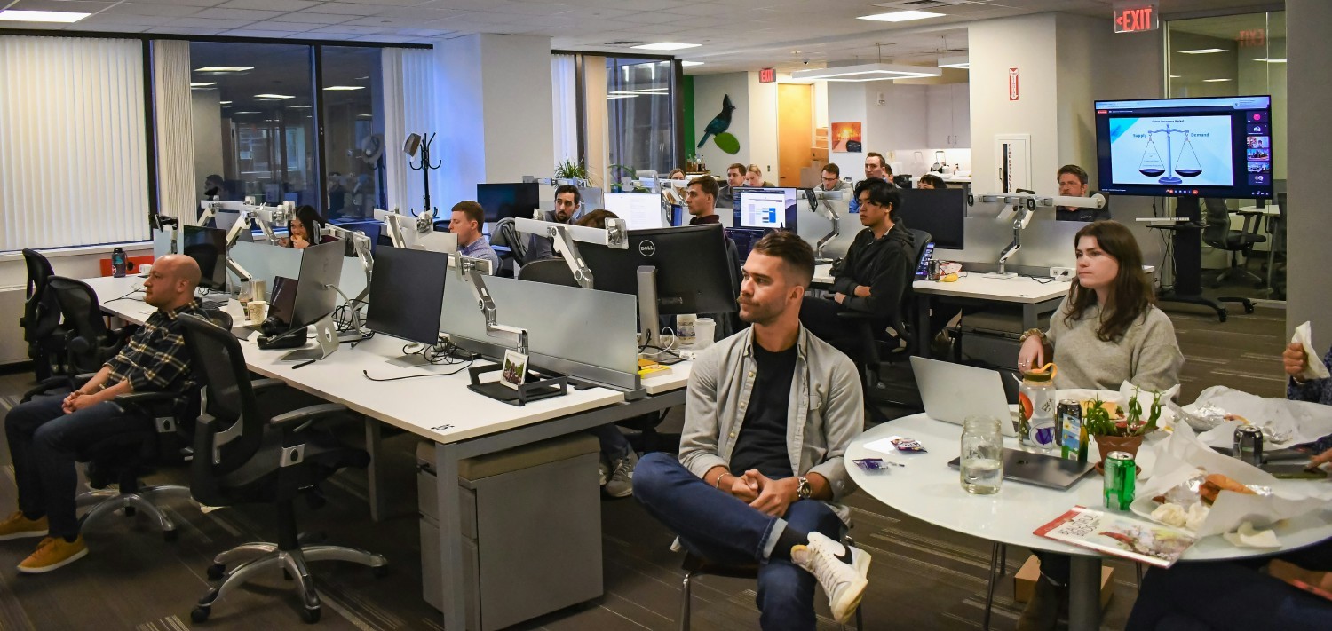 Corvus employees listen during an all-hands meeting at the company's headquarters in Boston, MA
