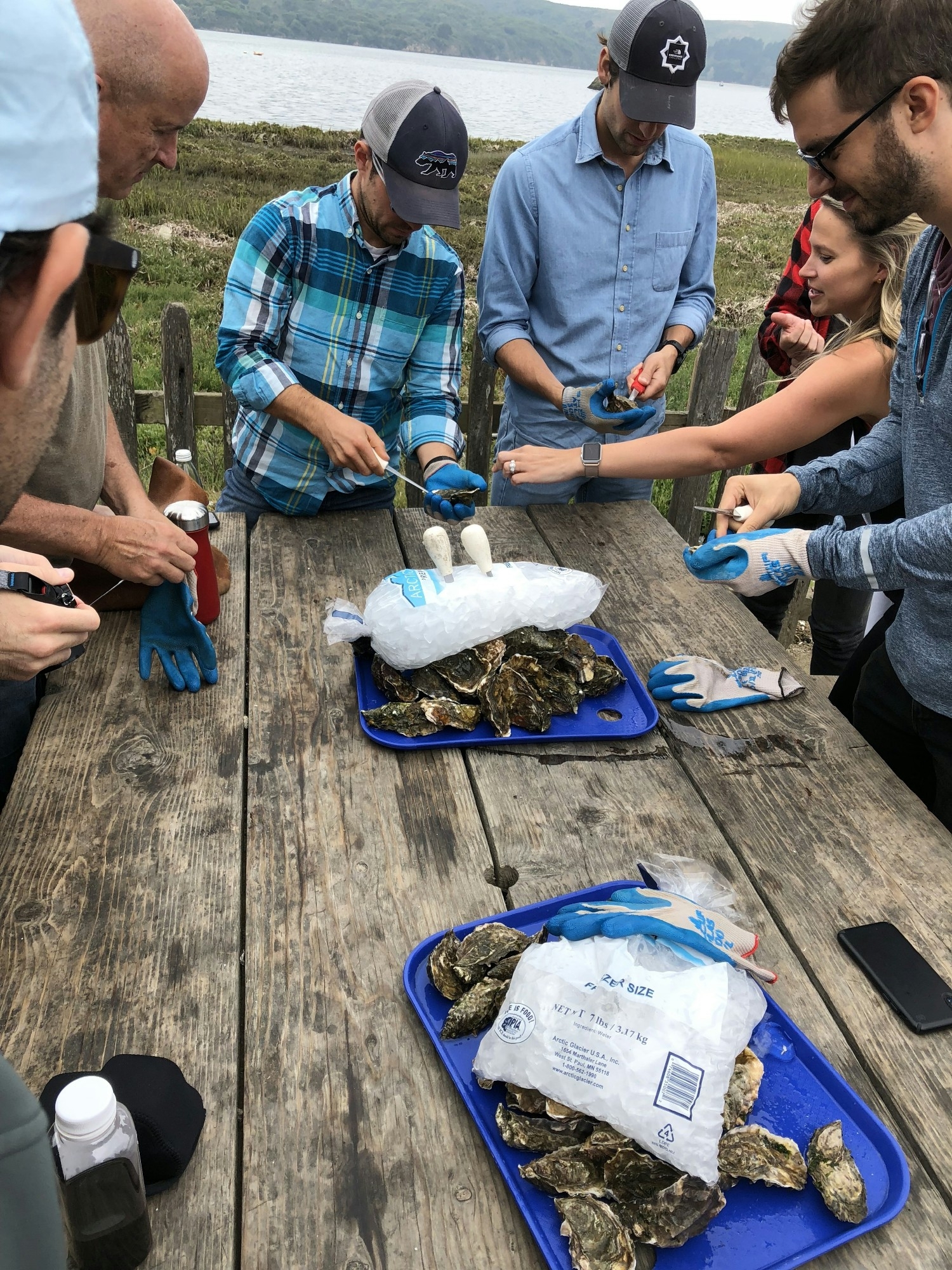 Shucking oysters at a company retreat.