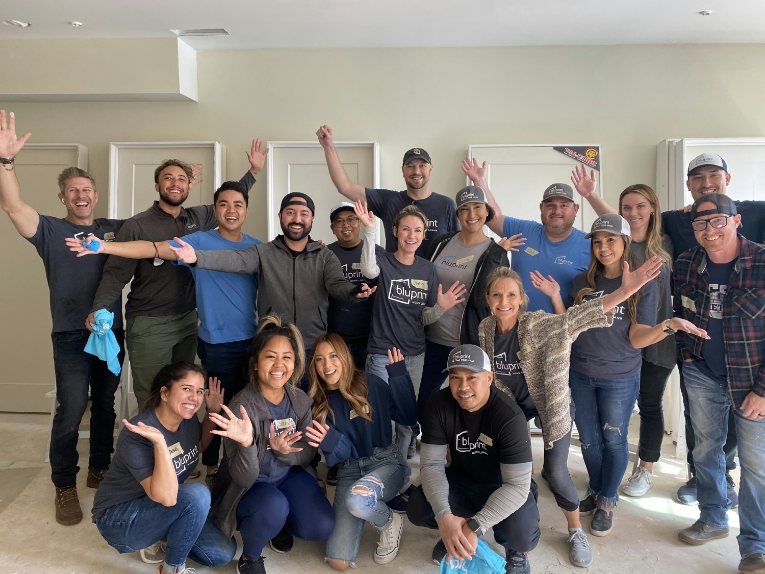 The BluPrint Home Loans volunteering together in San Diego, California for Habitat for Humanity.