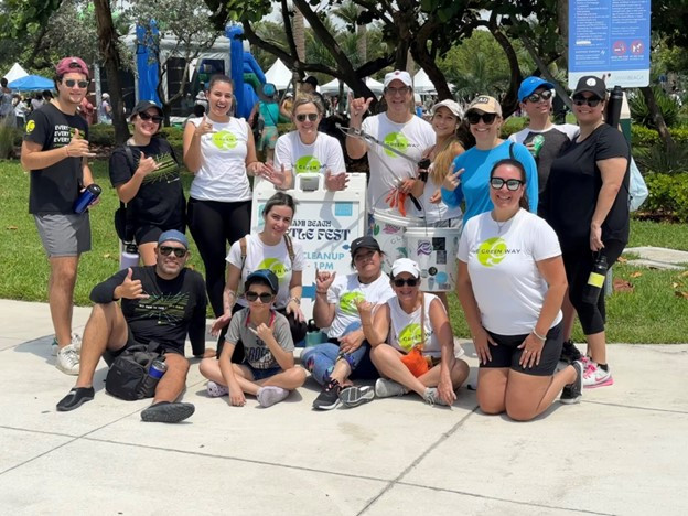 Our Miami Team coming together for beach clean-up.