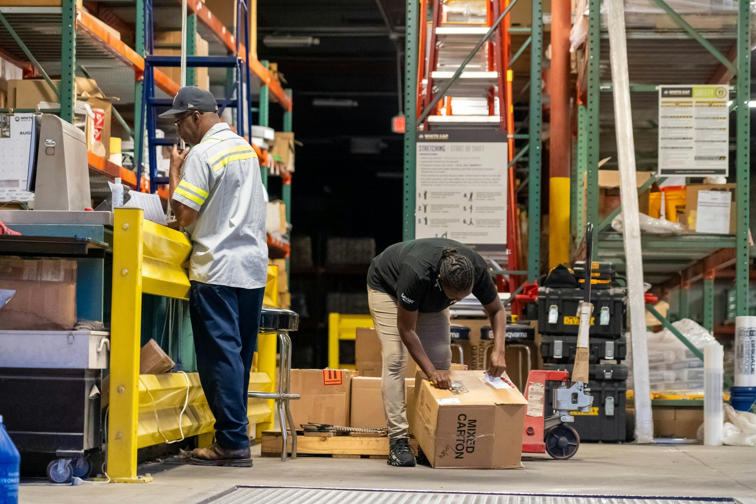 Our team works together in warehouses to ensure customers have everything they need when and where they need it. 