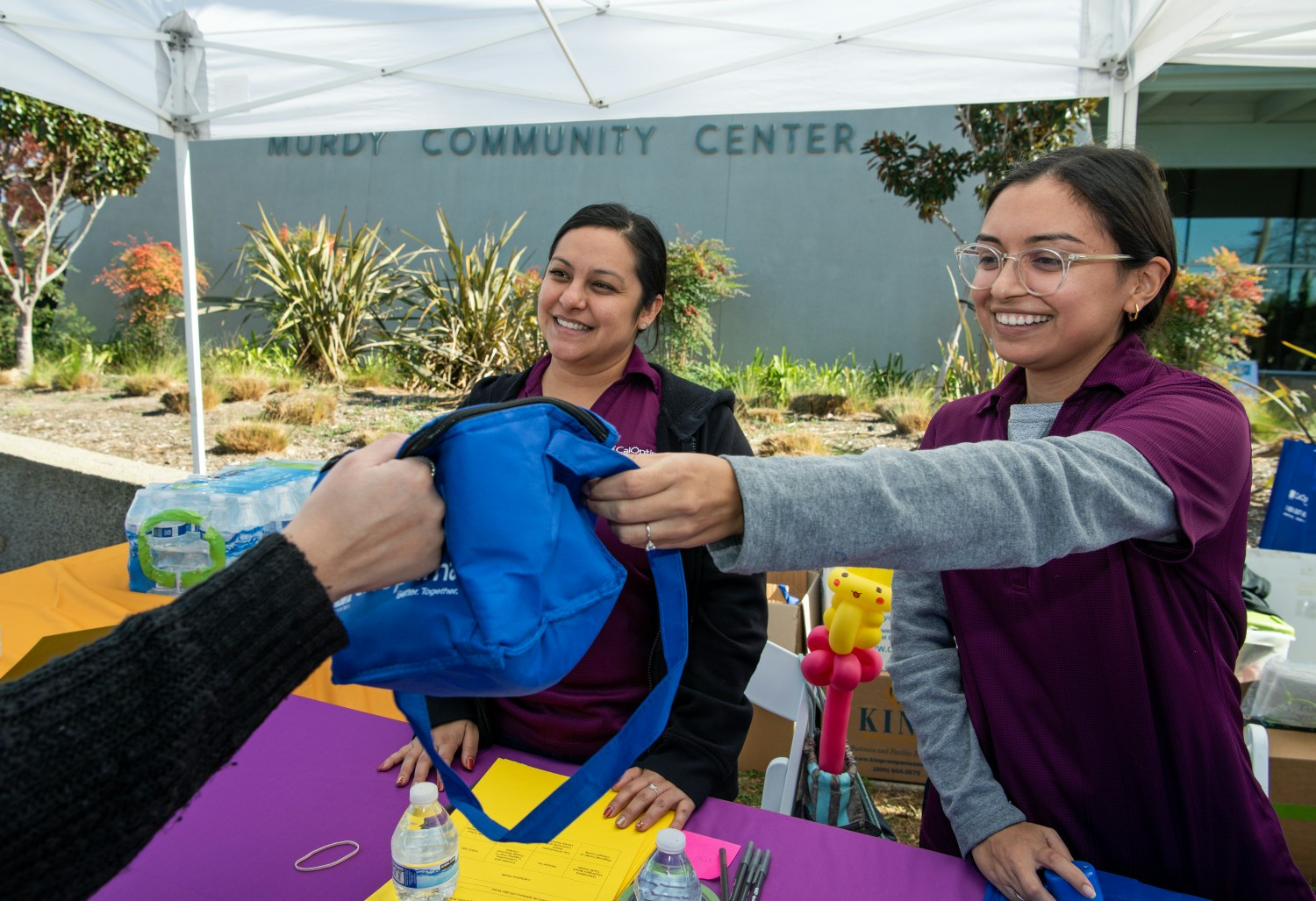 CalOptima Health employees work at community events to ensure members have easy access to resources.