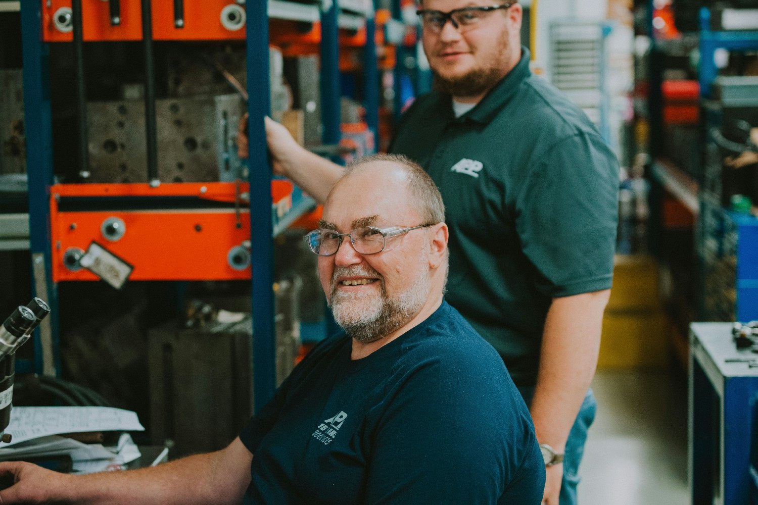 Two of our dedicated employees in the production area of our modern facility 