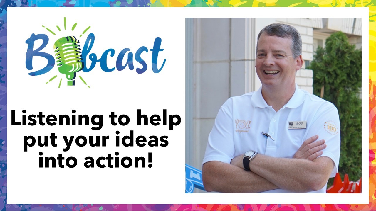 The image shows a promotional banner for the "Bobcast" program at Wegmans. The left side of the image features the word "Bobcast" in blue with a green microphone icon, and below it, the text "Listening to help put your ideas into action!" in bold black letters. On the right side, there is a man wearing a white polo shirt with crossed arms and a name tag that reads "BOB." The background has colorful borders with various hues. T