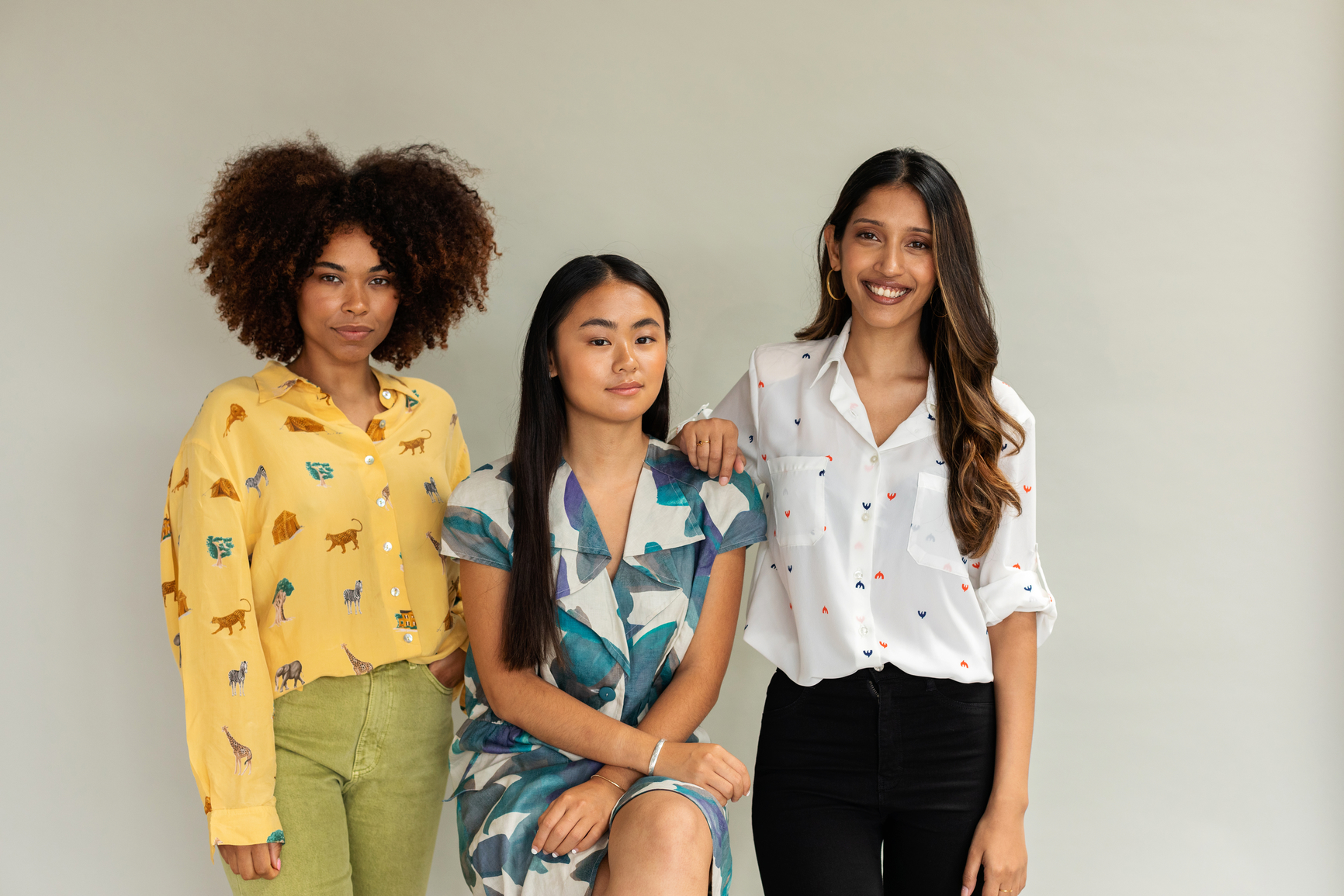  three women of different backgrounds and ethnicities