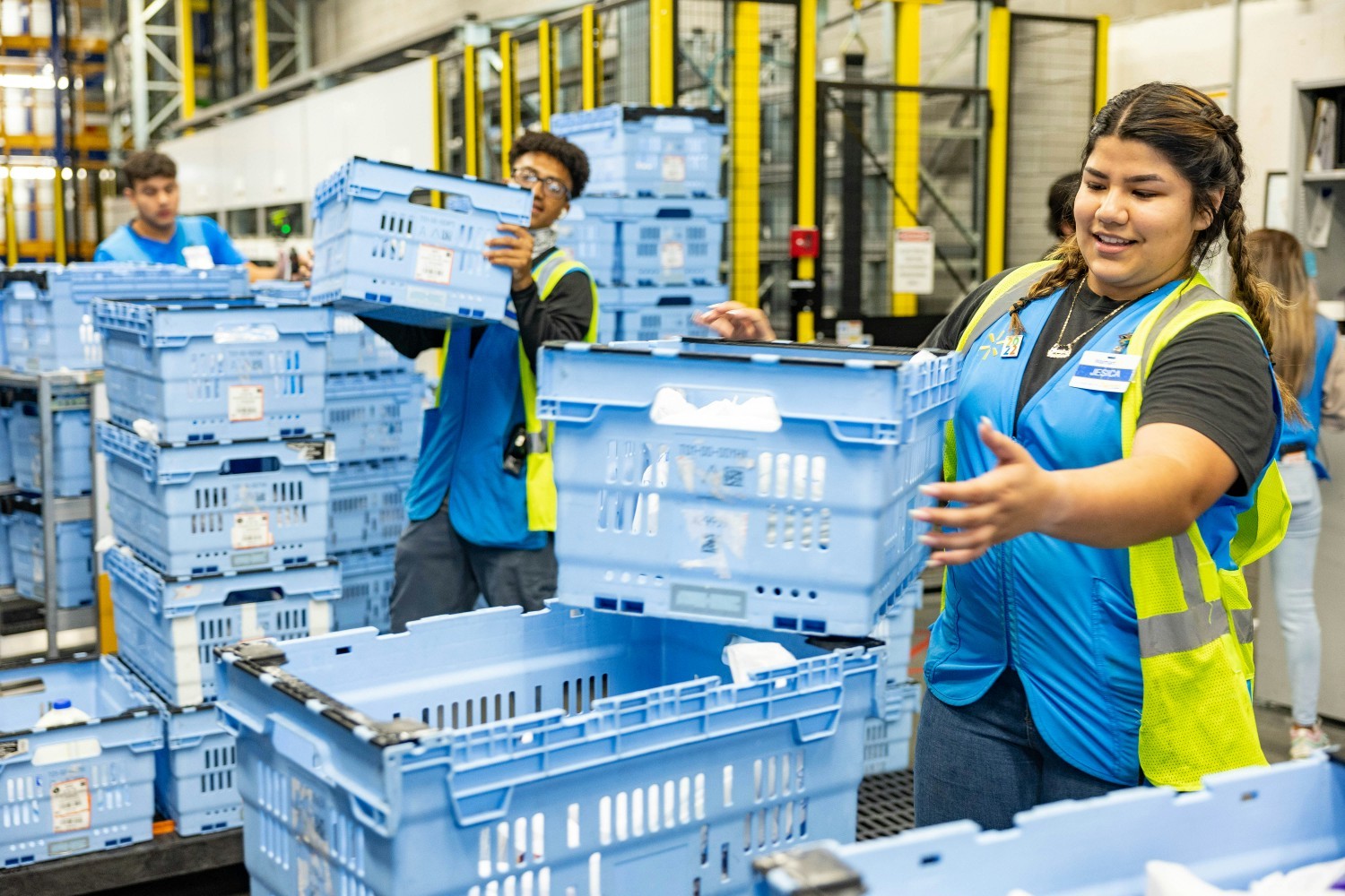 Walmart associates working the stock room