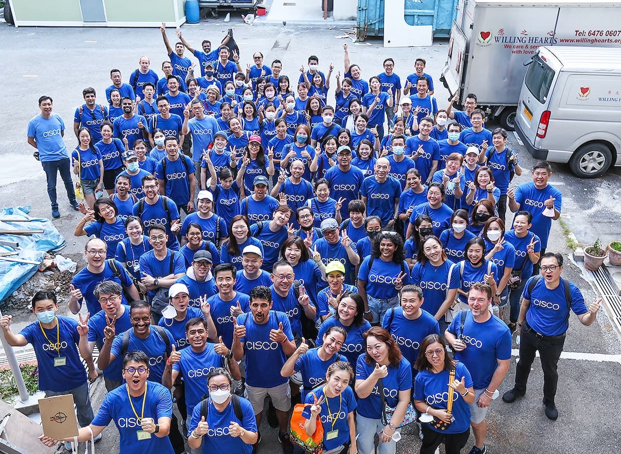  The 2023 best workplaces in Asia is depicted with an employee group photo. 