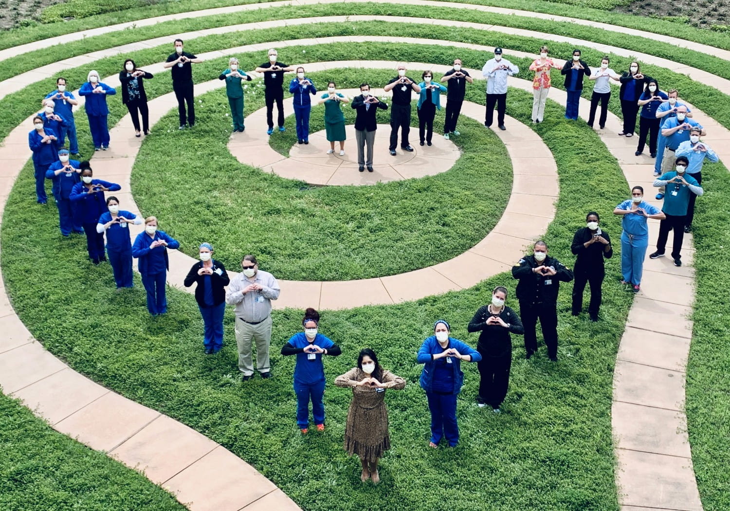  Employees at Texas Health Resources show their heart in group photo